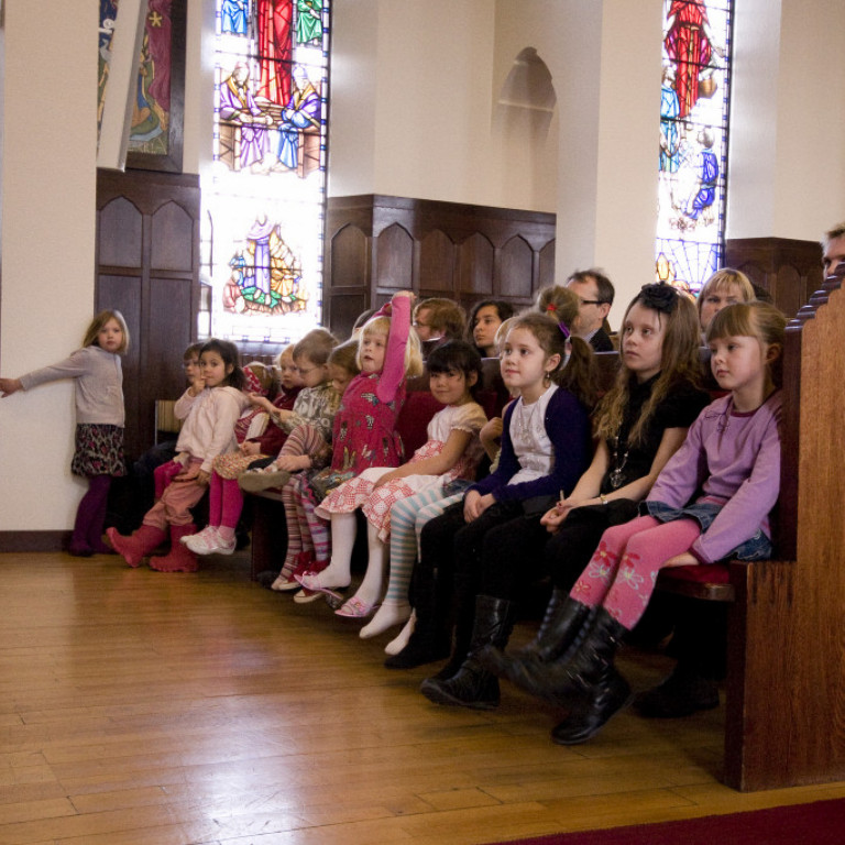 Barnakór Tónlistarskóla Akureyrar ásamt Heimi Bjarna Ingimarssyni.
